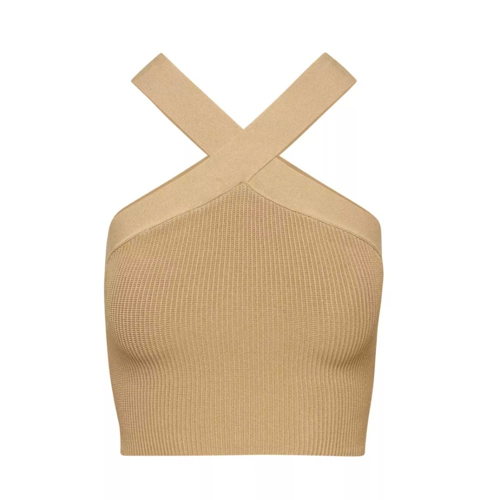 A cropped crossover top with a lined texture